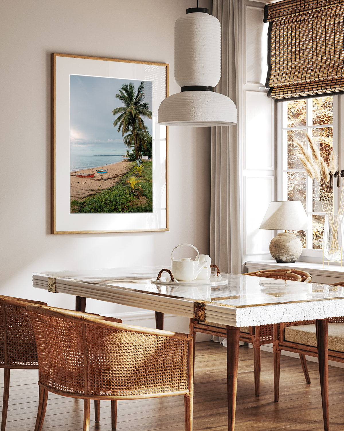 modern dining room decor featruing framed beach photograph taken in Rincon, Puerto Rico