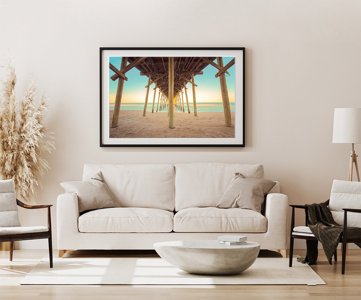 modern living room decor featuring large pier sunset beach photograph by Wright and Roam