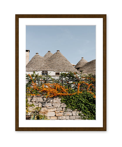 Italy Wall Art featuring the Trulli Houses in Alberobello in dark wood frame.