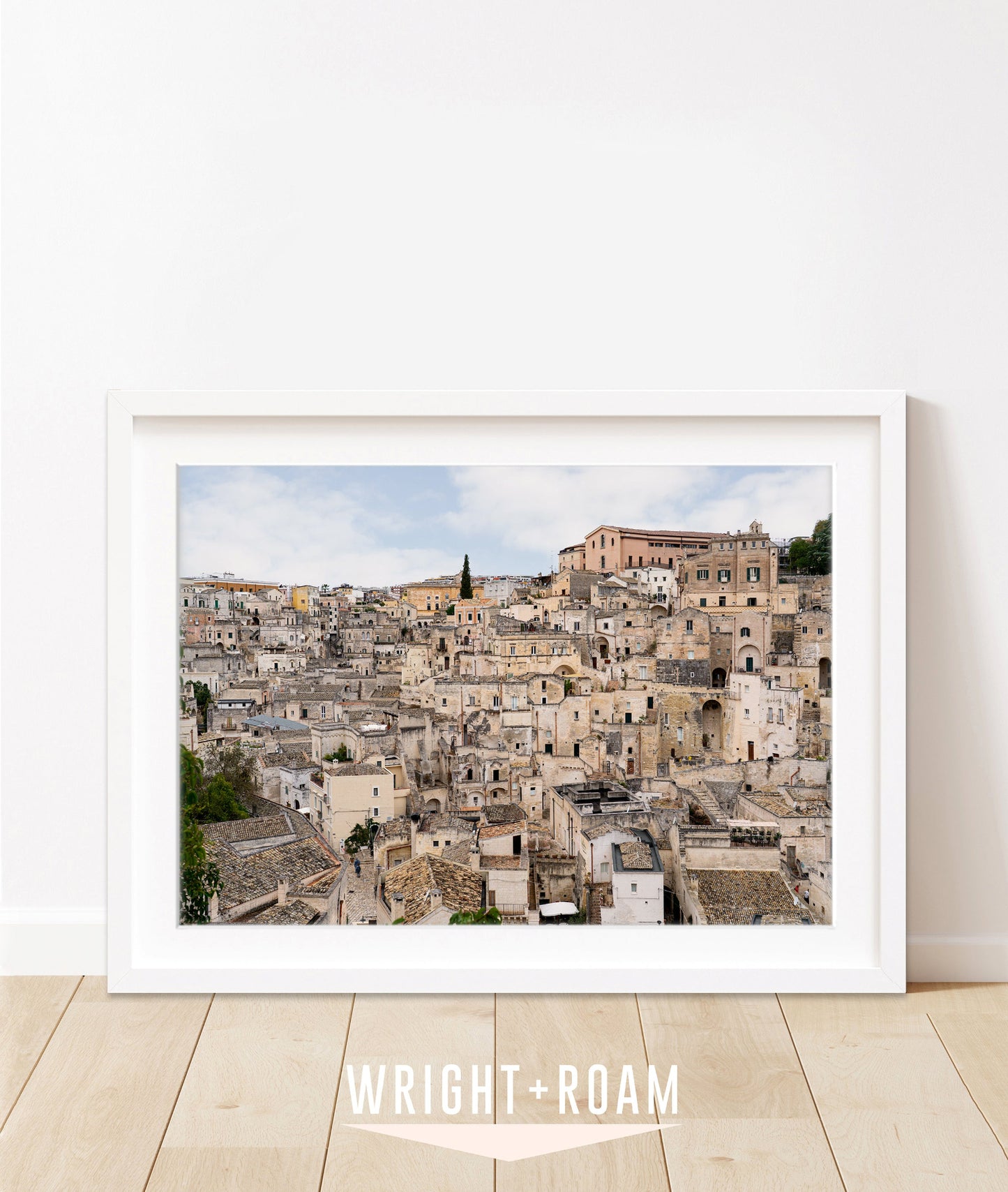 fine art Italy photograph featuring the texrtured stone Italian streets of Matera in a white frame.