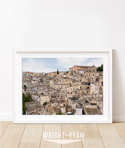 fine art Italy photograph featuring the texrtured stone Italian streets of Matera in a white frame.