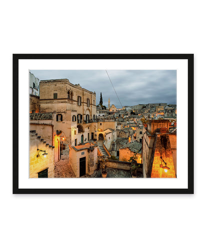 Italy Photograph feautring historic Matera, Italy at twilight in black frame.