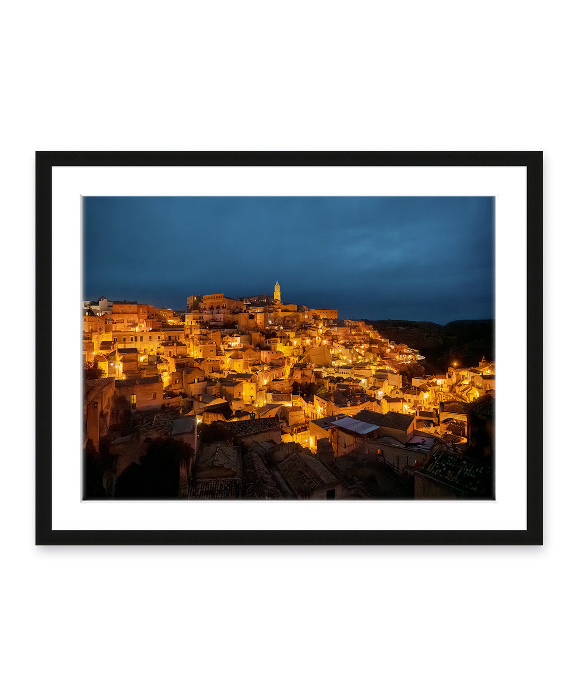 italy photography feautring Matera, italy at night with golden glow and Navy sky in a black frame