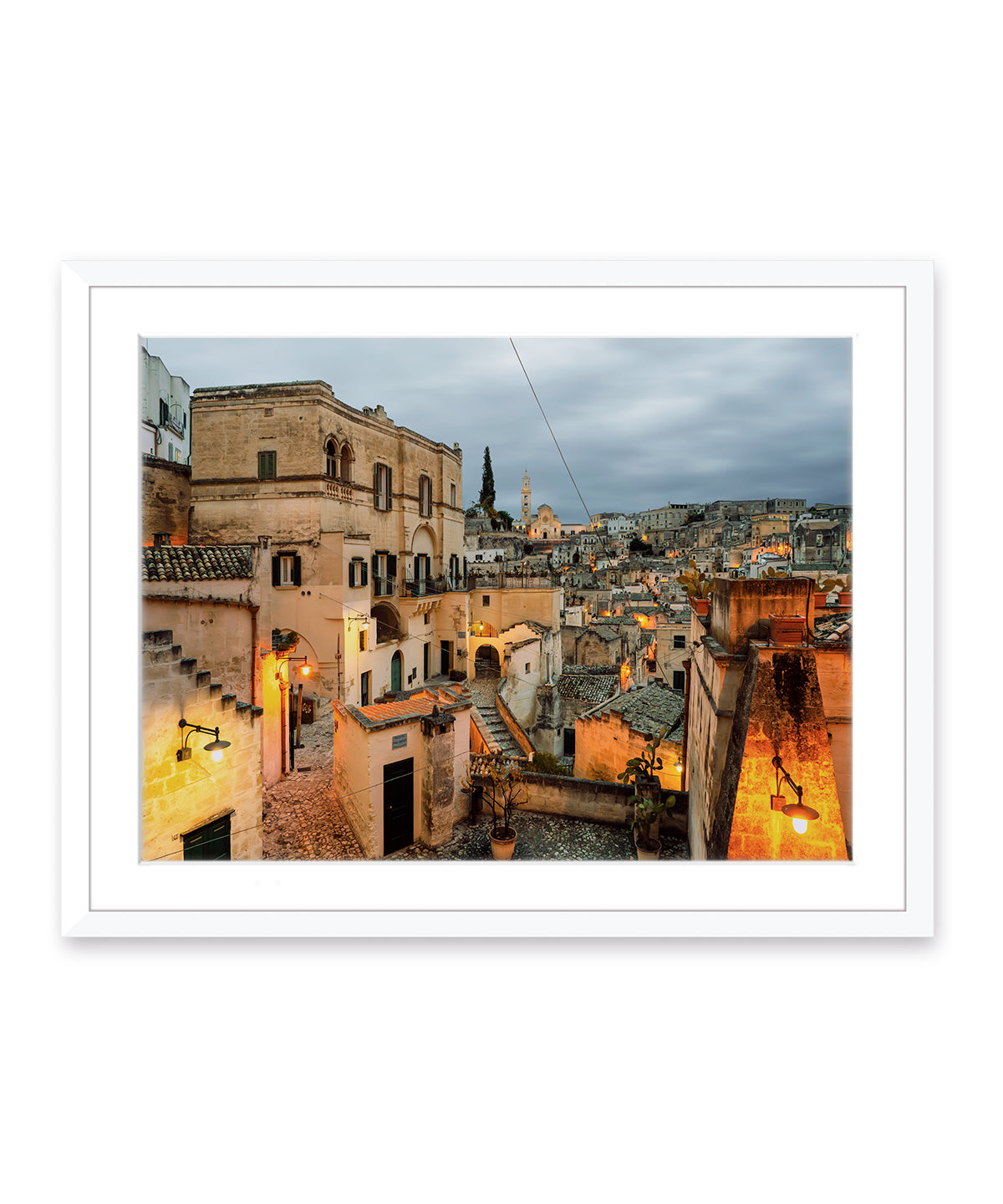 Italy wall art print feautring historic Matera, Italy streets at twilight in White Frame.