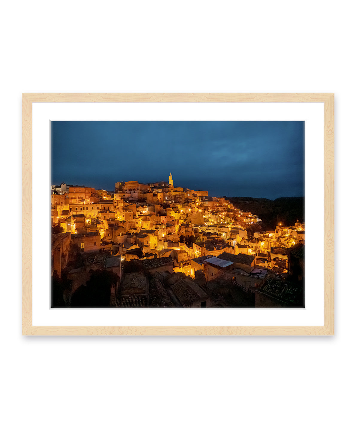 framed italy art feautring Matera at night with golden streetlights and Navy sky in a light wood frame