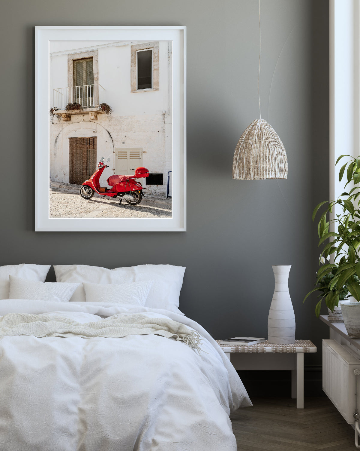 bedroom decor featuring historic building in italy accented by red moped.