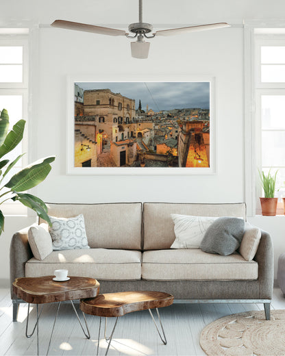 framed southern italy photograph featuring Matera, Italy at night displayed in a European inspired interior.