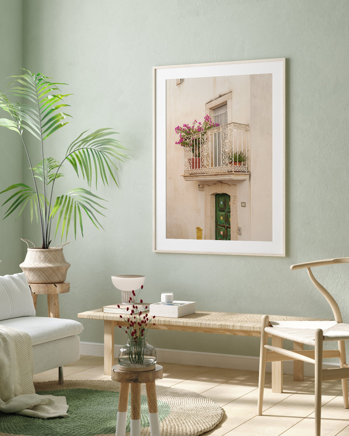 coastal home decor feautring natural wood accents and framed minimal italy wall art of textured wall and balcony.