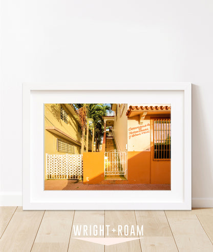 Colorful architecture photography feautring orange buildings in Rincon, Puerto Rico.