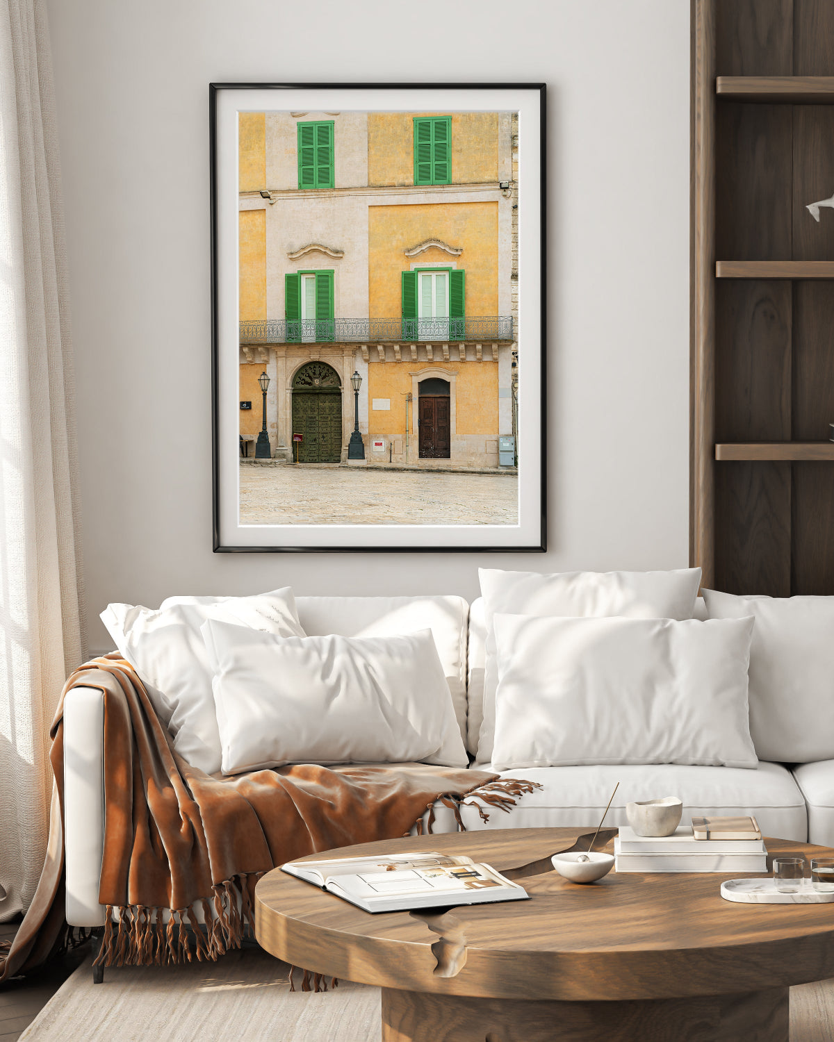 old world neutral decor with framed wall art featuring italy photograph with historic buildings filled with texture and neutral hues.