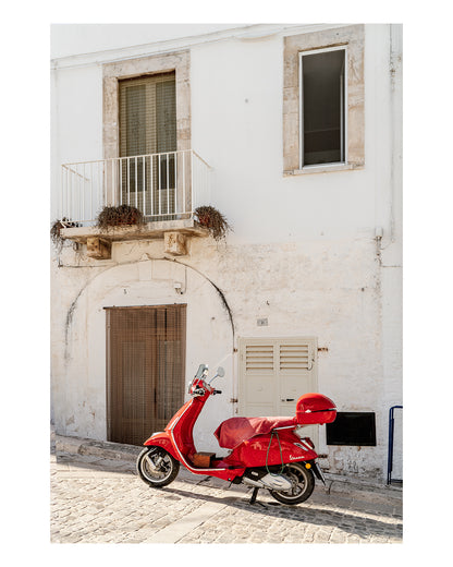 fine art italy photograph featuring white textured building accented by red moped.
