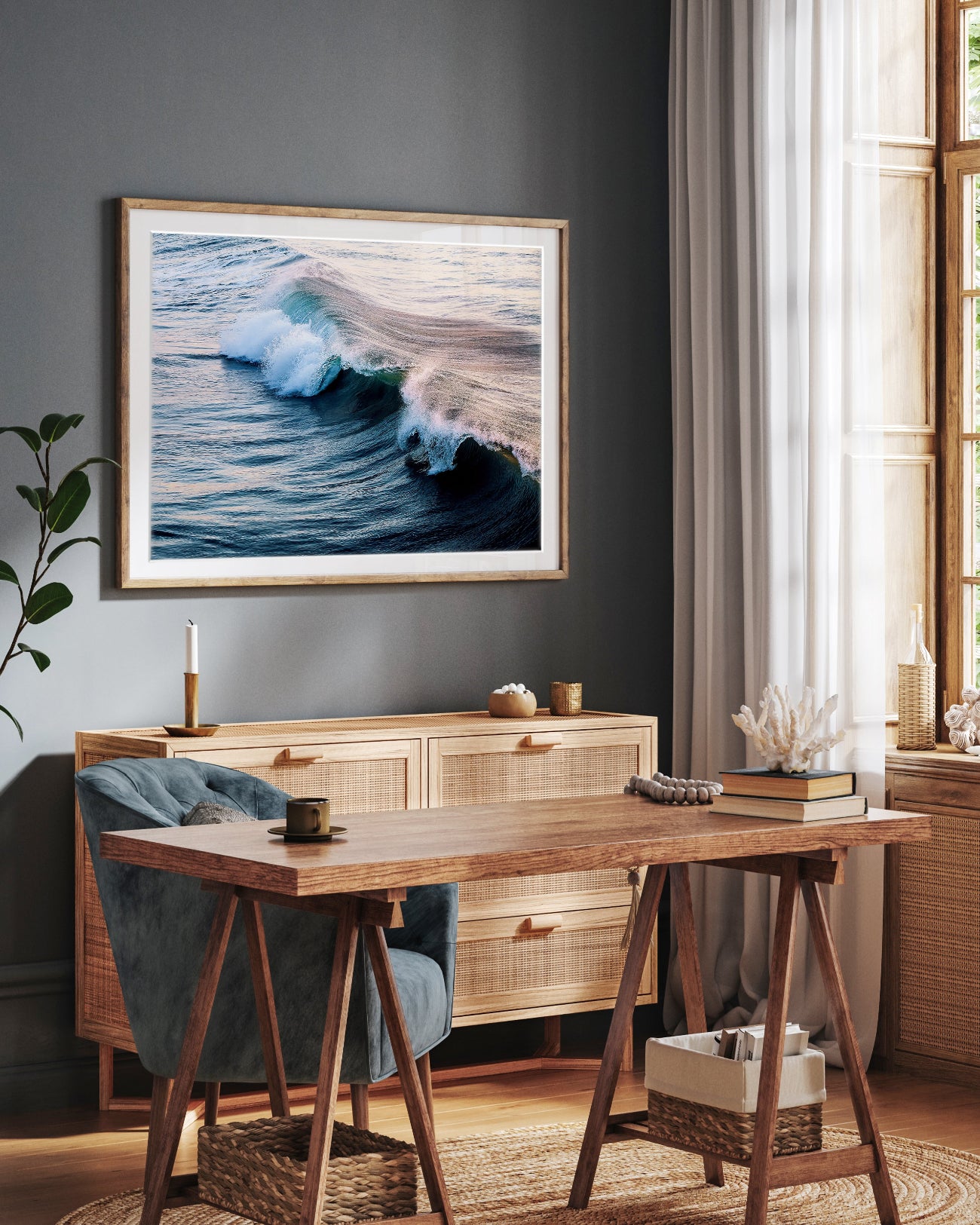 Moody office decor with framed photograph of a deep indigo blue wave