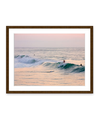 pink sunrise surfing wrightsville beach dark wood frame