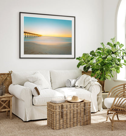 coastal beach house living room decor featuring blue and yellow sunset Carolina beach photograph by Wright and Roam 